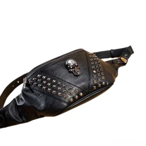 Studded skull waist bag 3/4 angle showing pyramid metal studs and gothic skull decor on black PU leather