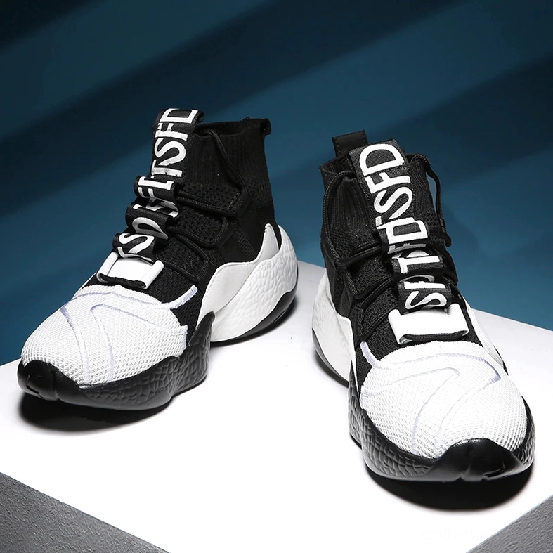 Gothic alternative sneaker black upper with vibrant trim multi-color thick segmented outsole detailed view