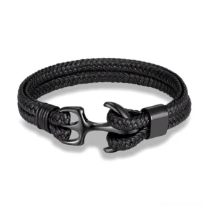 Black matte stainless steel anchor bracelet with black genuine leather braided rope cord, top-down view