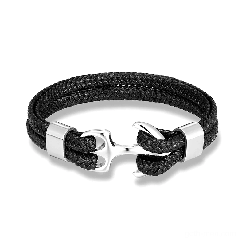 Silver polished stainless steel anchor bracelet with black woven genuine leather cord, overhead view