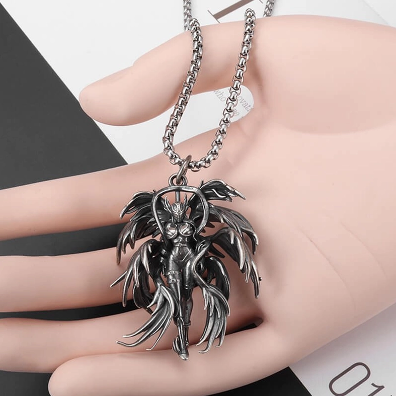 Gothic angel pendant necklace on silicone mannequin hand showing real-life wearing scale and proportion relative to hand size