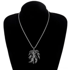 Gothic angel pendant necklace worn on black display bust mannequin, showcasing how the pendant sits at chest level with chain
