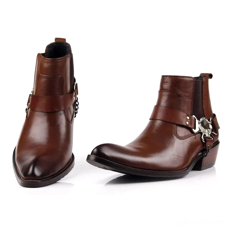 Brown leather gothic ankle boots with polished finish and metal buckle decoration, side front view