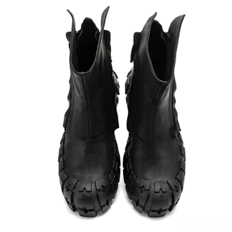Direct front view of black gothic ankle boots showing smooth leather upper, protective toe caps, and aligned chunky soles