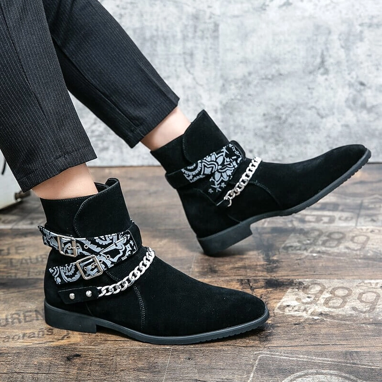 Black suede gothic ankle boots lifestyle shot showing authentic wear styling with alternative fashion aesthetic
