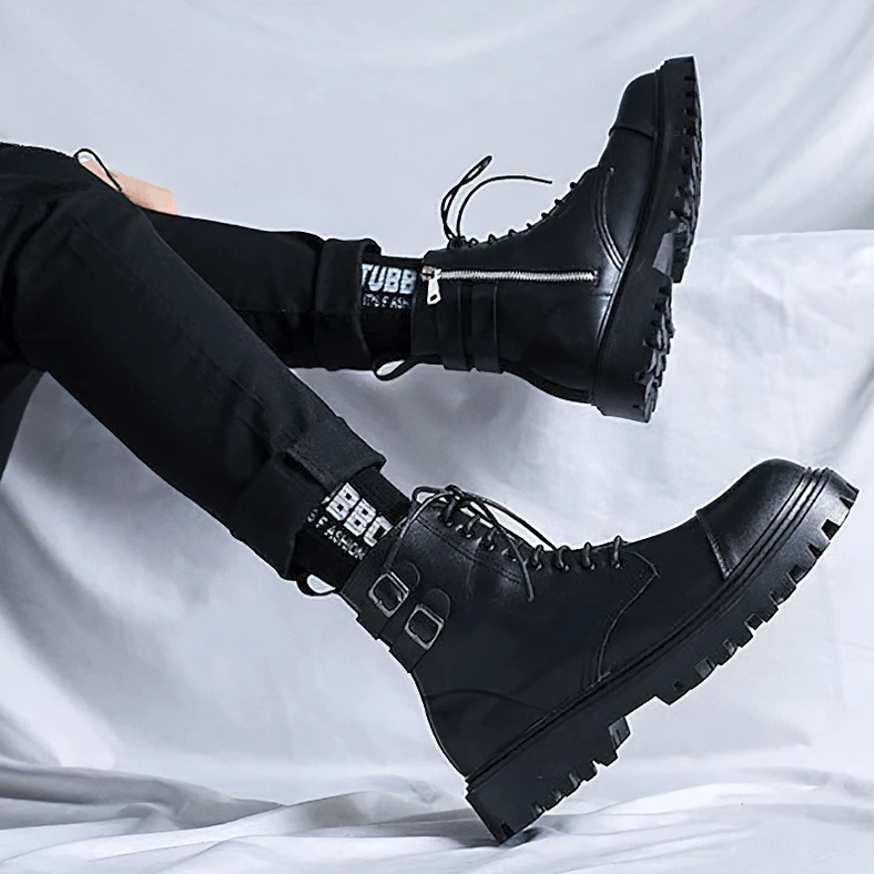 Black gothic lace-up ankle boots bottom view displaying sole pattern and craftsmanship