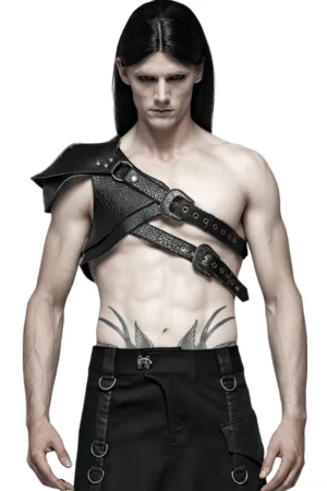 Black gothic leather shoulder armor harness with vintage bronze buckles worn by male model, front view studio photography
