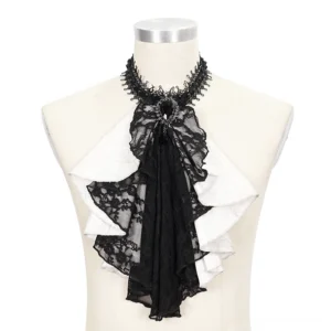 Gothic ascot neck tie on dress form mannequin front close-up, featuring black lace overlay, layered white ruffles, and central black gem ornament detail
