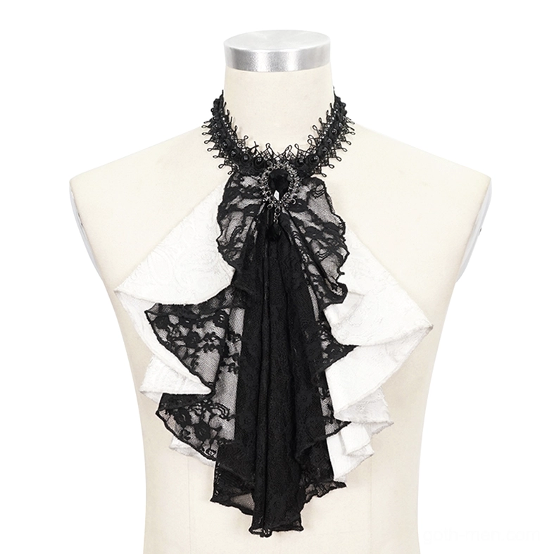 Gothic ascot neck tie on dress form mannequin front close-up, featuring black lace overlay, layered white ruffles, and central black gem ornament detail