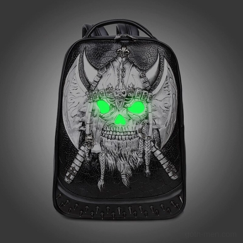 Silver embossed skull gothic backpack with glowing neon green eye detail