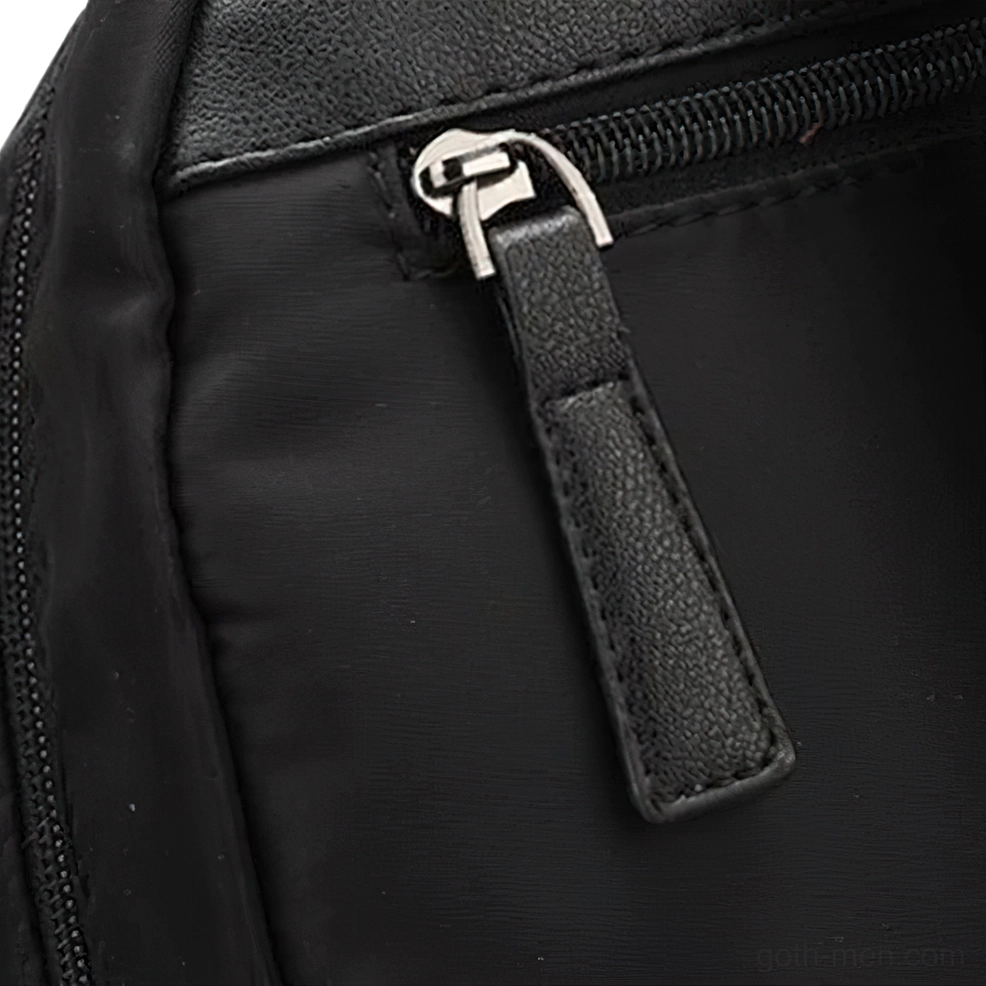 Gothic backpack leather hardware details zipper pulls minimalist fashion style