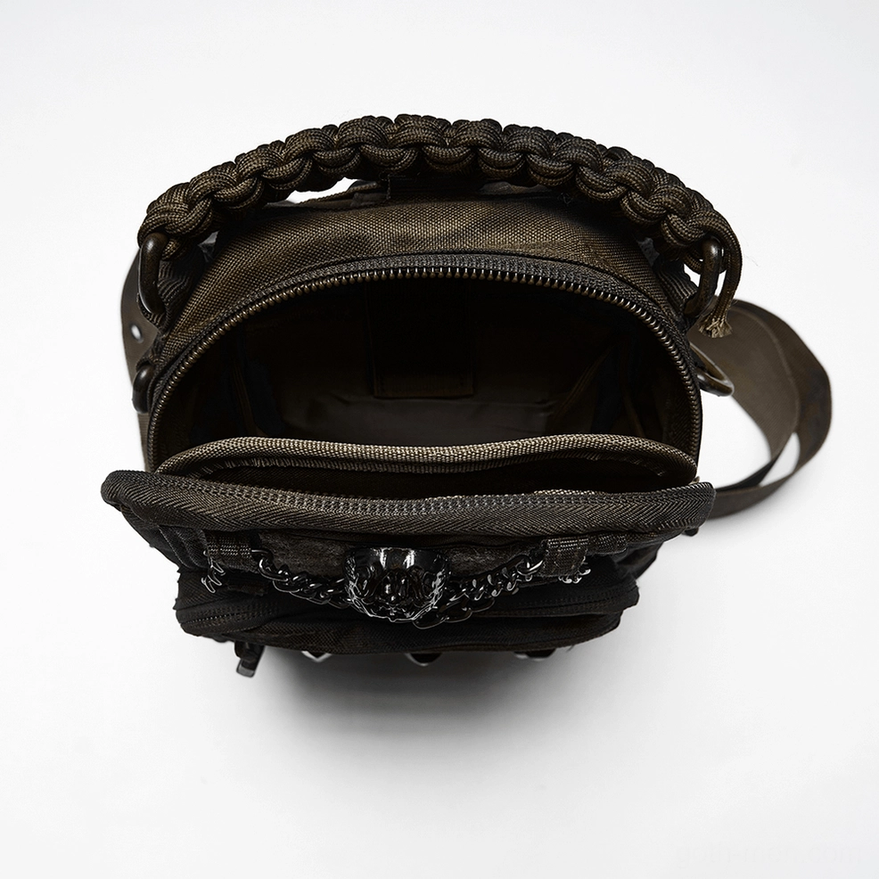 Interior open view of tactical gothic crossbody bag showing zippered compartments and woven rope top handle