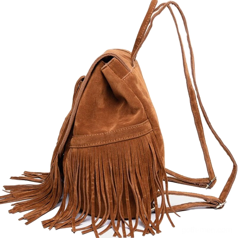 Brown suede gothic backpack side view showing adjustable shoulder straps and side tassel details