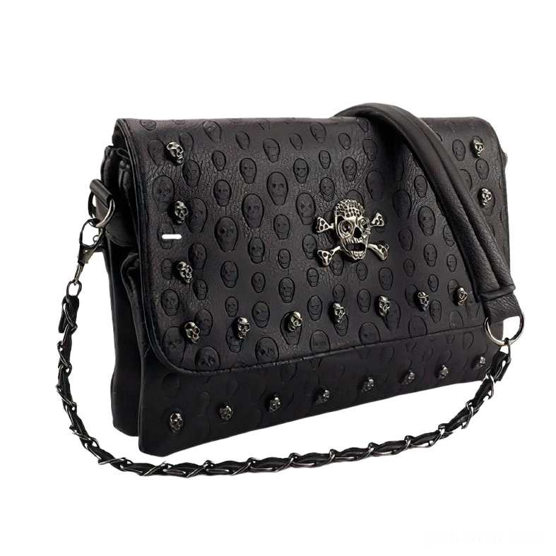 Three-quarter side perspective of embossed skull gothic handbag with all-over rivet metal embellishment and chain strap
