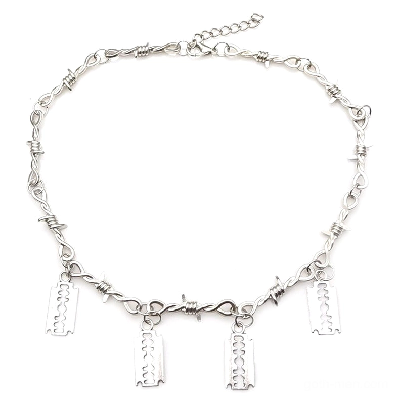Silver gothic barbed wire choker laid flat overhead view showing adjustable extension chain tail and full pendant width - top-down product shot