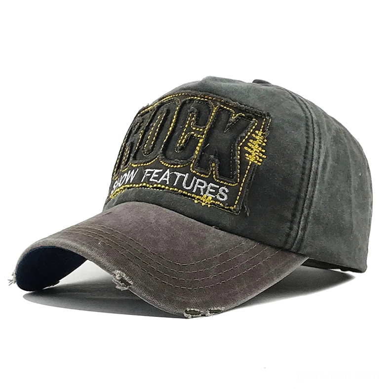 Dark gray faded gothic denim baseball cap front three-quarter view with ROCK embroidery and intentional distressing