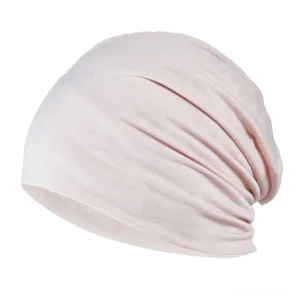 Beige neutral stretch beanie hat showcasing soft knitted fabric texture and gothic simplicity