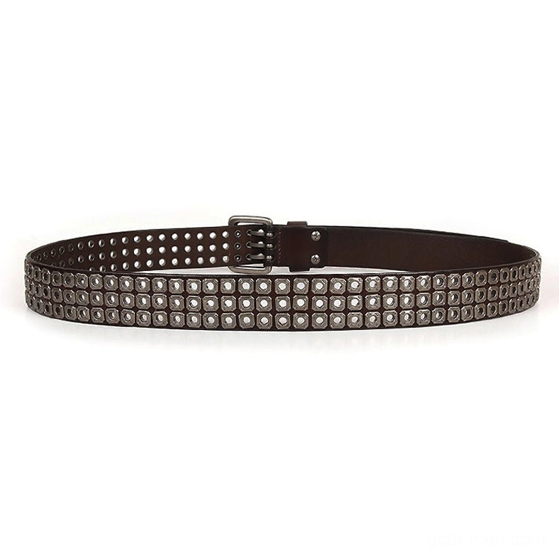 Gothic studded leather belt detail showing vintage silver buckle and square metal grommet construction