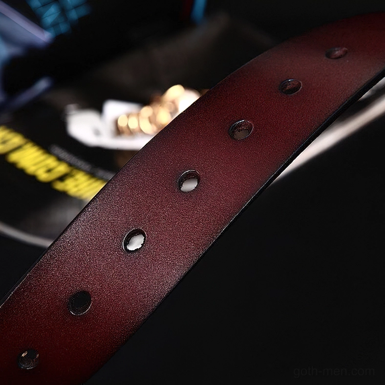 Authentic cowhide leather belt with substantial metal buckle for gothic and alternative style, close-up