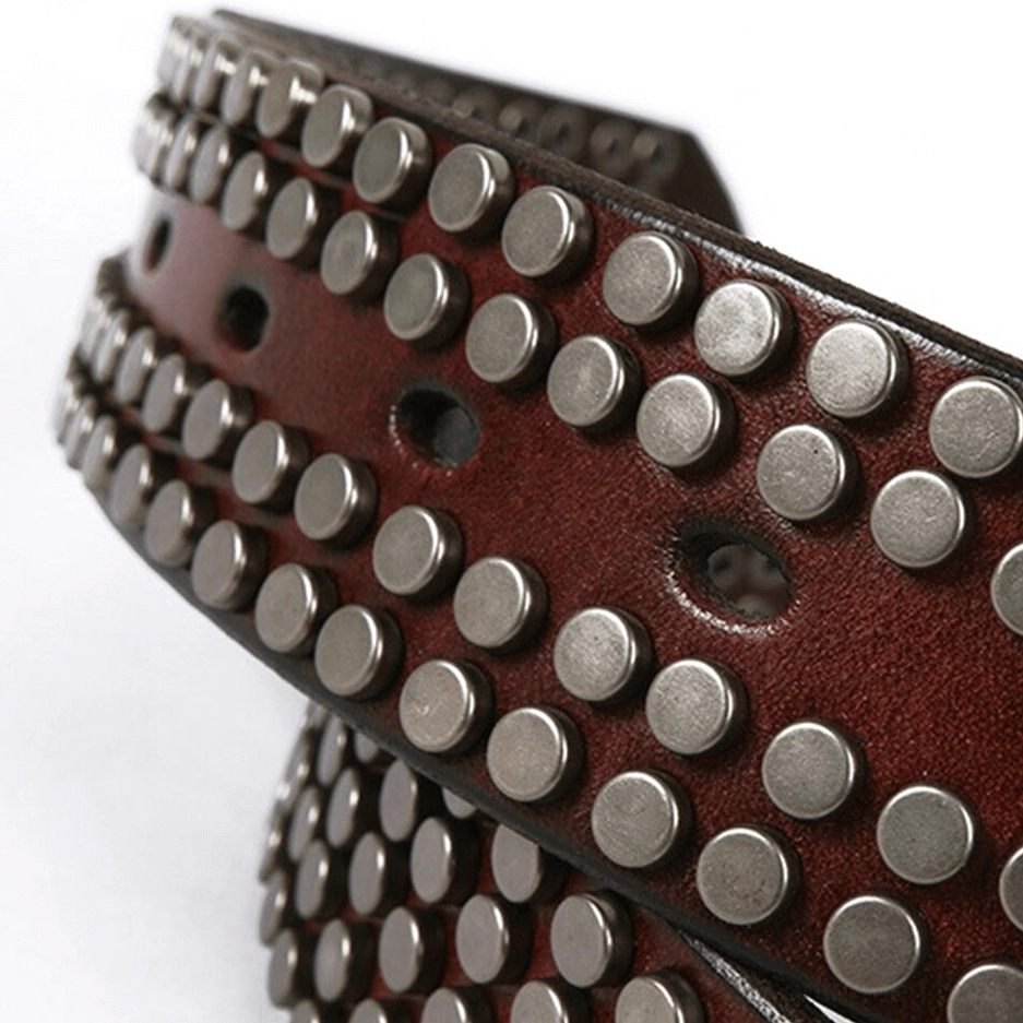 Alternative fashion leather belt with pin buckle and metal studs - full length flat lay