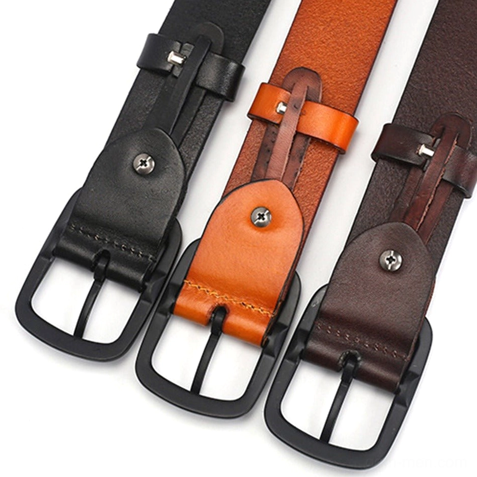 Close-up of metal cone studs on gothic leather belt showing industrial rivet craftsmanship