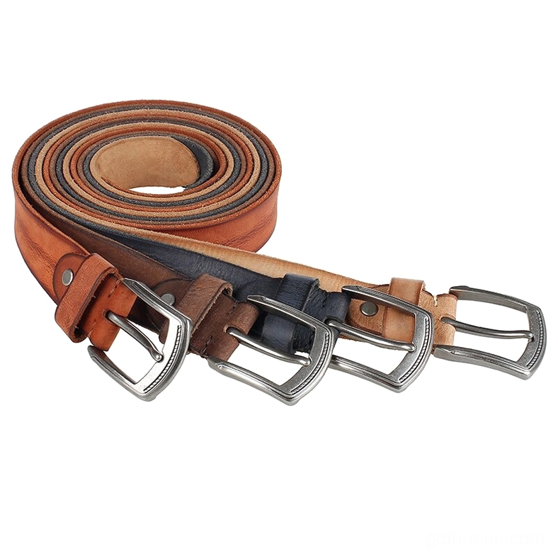 Assorted collection of five handcrafted cowhide gothic belts in vintage colors with matching antique alloy buckles, flat lay overhead composition