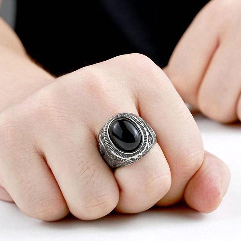 Gothic bezel ring craftsmanship, stainless steel quality, embossed band construction detail