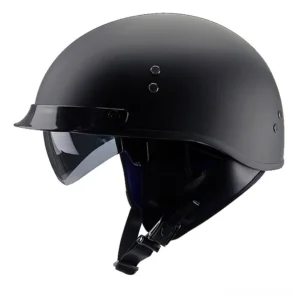 Matte black half-face gothic motorcycle helmet with metal rivets, integrated sun visor, and brown leather trim - front three-quarter view showing authentic biker aesthetic