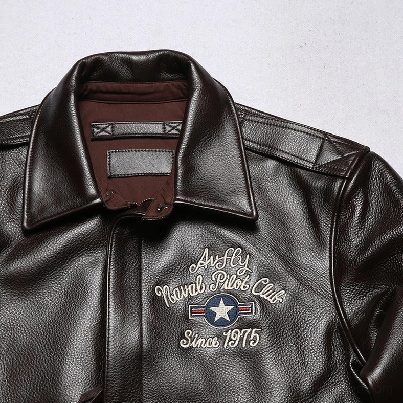 Gothic leather biker jacket showing full silhouette with embroidered details and utility zipper system