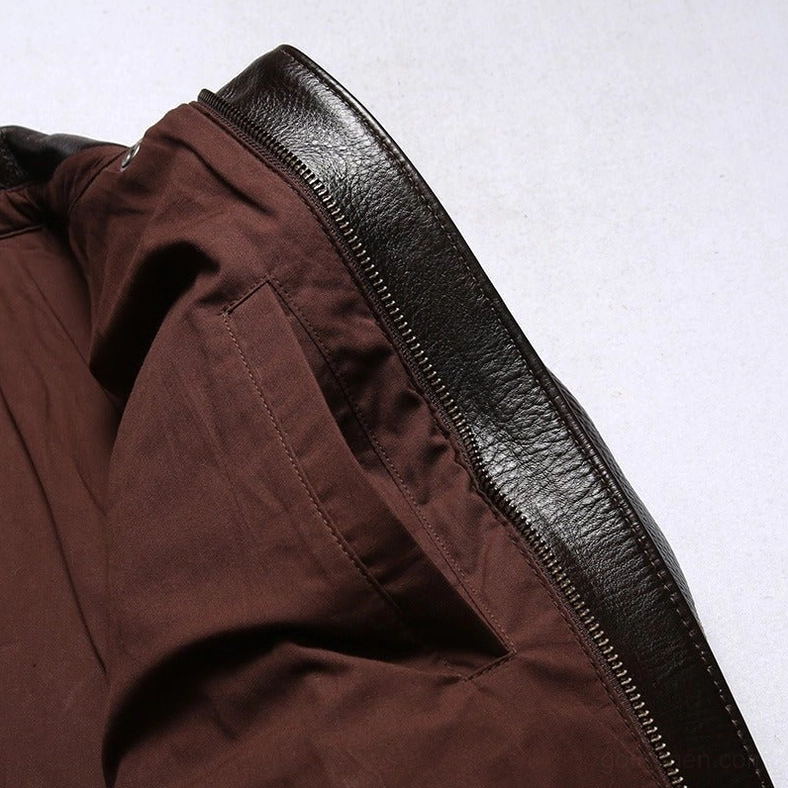 Men's gothic leather jacket hem and lower construction showing quality stitching and ribbed finishing