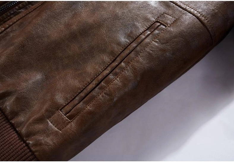 Topstitched seam and tailored pocket construction gothic biker jacket detail