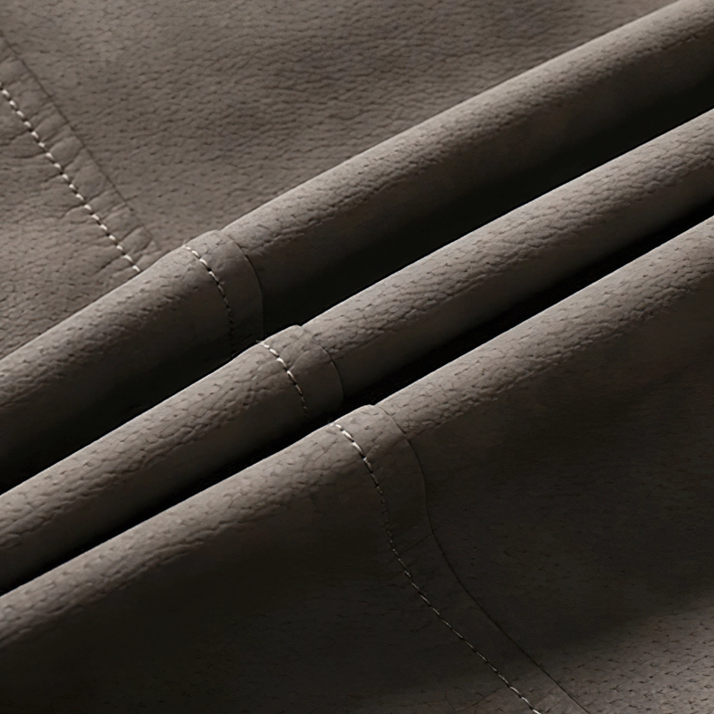 Sleeve zipper functional detail on gothic PU leather biker jacket showing adjustable design