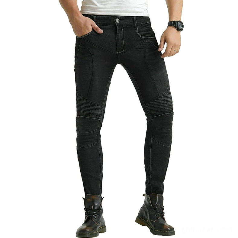 Solid black gothic biker pants front three-quarter view with pleated knee armor and leather boots