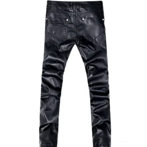 Back view of men's gothic black biker pants - reinforced rear patch pockets with metal rivets, slim fit straight cut, coated denim construction