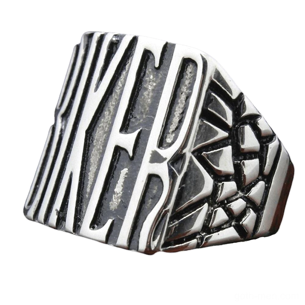 Tilted side view of gothic biker ring showing textured cracked side pattern and bold letter design in vintage silver tone