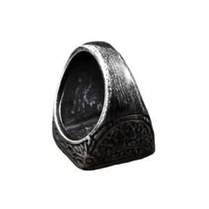 Gothic biker ring side interior view showing carved engraved details on aged black metal