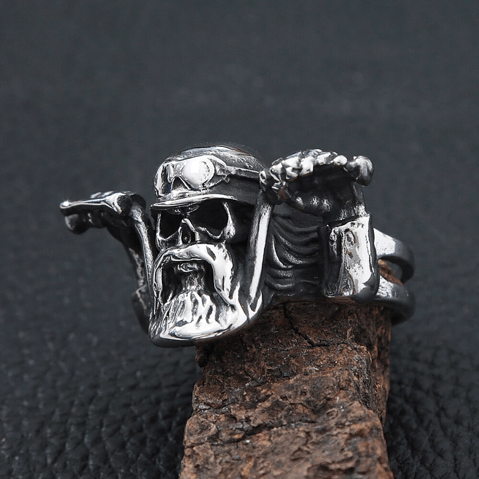 Skull wearing vintage pilot goggles on gothic motorcycle ring three-quarter front perspective