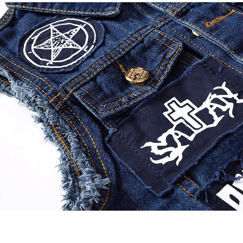 Chest pocket and upper body detail of blue gothic denim biker vest displaying SATAN patch, metal button closure, and distressed armhole fraying