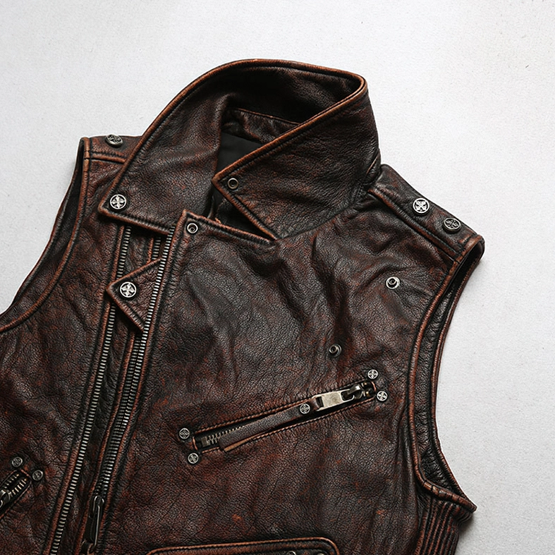 Metal snap button collar detail on distressed leather gothic biker vest - industrial gothic hardware