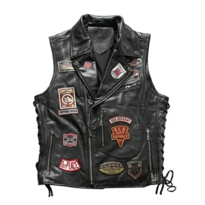 Men's black gothic biker leather vest front view with asymmetrical zipper closure and vintage embroidered patches