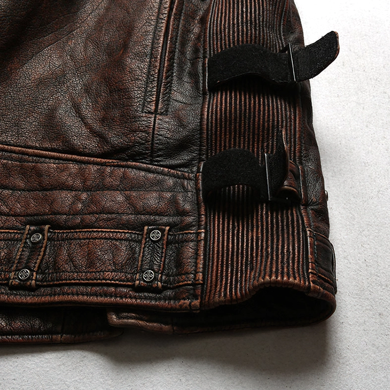 Texture and material detail of distressed genuine cow leather gothic biker vest - vintage patina finish