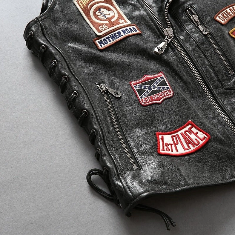 Flat side profile of men's gothic cowhide leather motorcycle vest with 1st PLACE patch and adjustable lacing