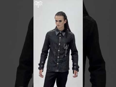 Medium angle view of fitted black gothic shirt with pocket chain tassel and adjustable buckle cuffs on slim model