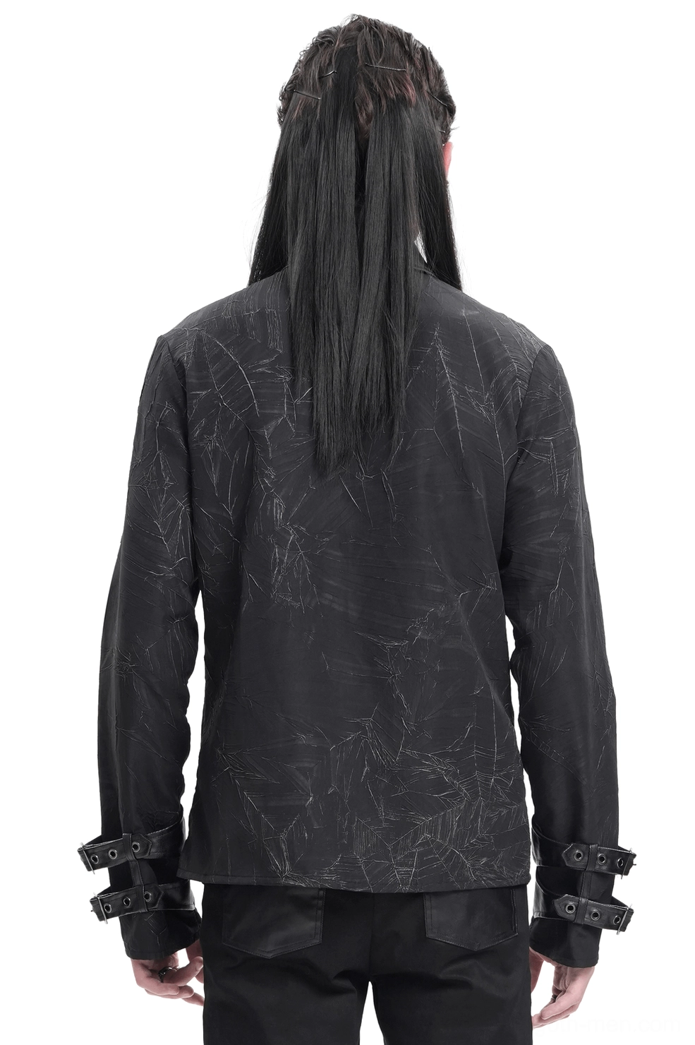 Back view of gothic black shirt with buckled cuffs and layered cracked fabric design worn by model with braided hair