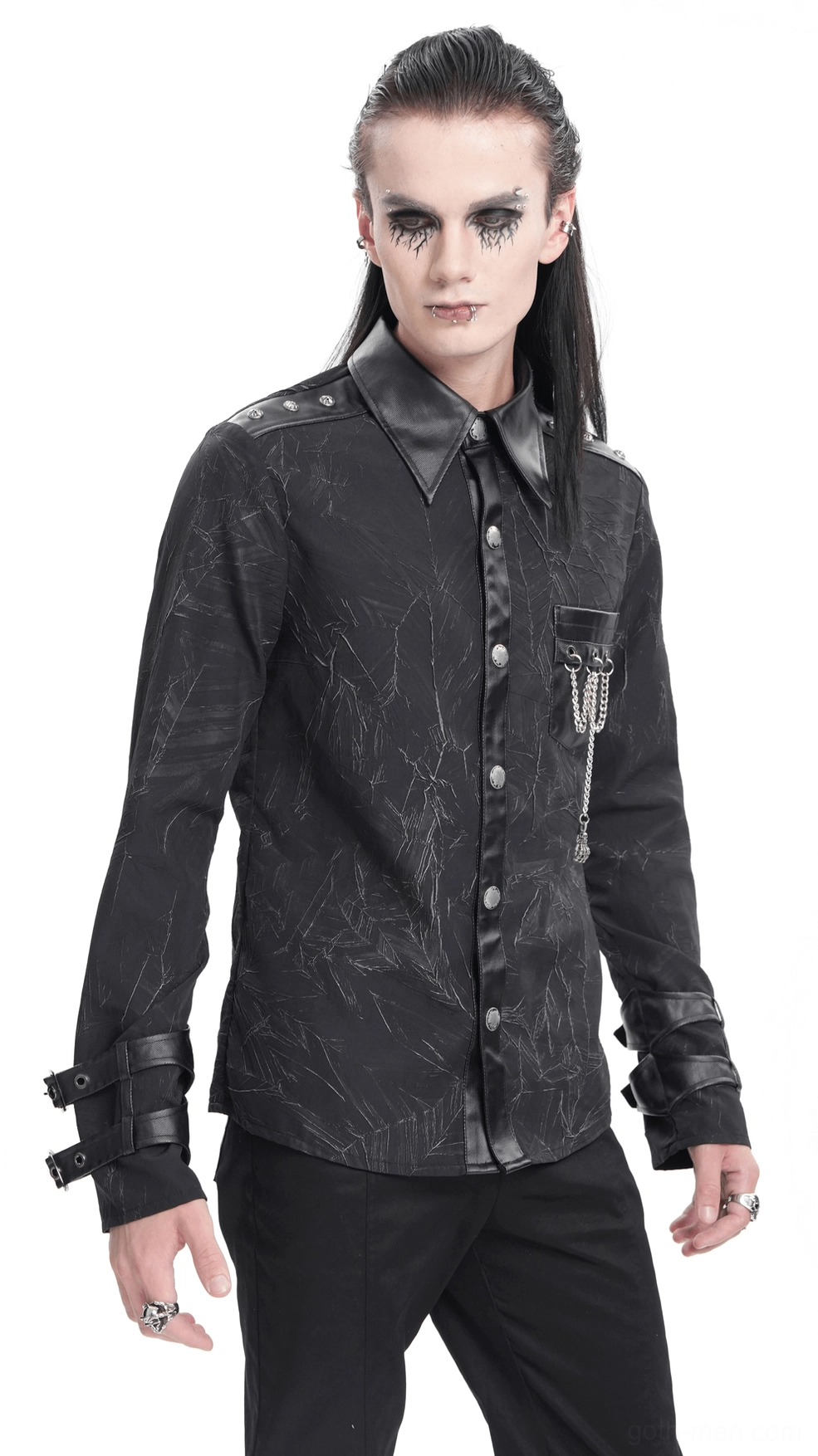 Detail view of black gothic chain shirt showing cracked texture pattern and layered fabric construction