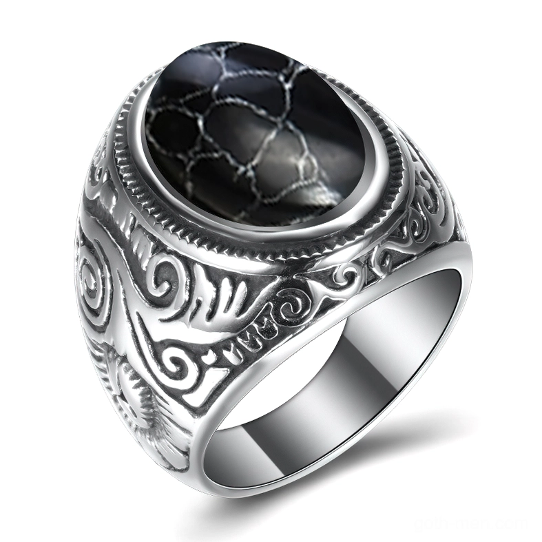 Gothic cracked black stone stainless steel ring with vintage engraved band, three-quarter view showing dark stone inlay and decorative metalwork