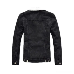 Black gothic denim jacket rear view showing back yoke design and adjustable snap fasteners at hem, minimalist goth style