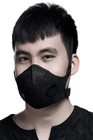 Black gothic breathable face mask with metal buckle closure worn by male model, frontal view showcasing dual textured panels and ventilation