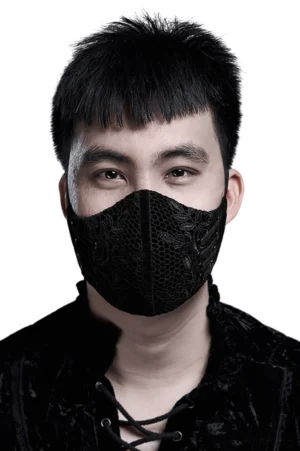 Black gothic lace and velvet face mask for men, frontal studio view showing floral embroidery and adjustable elastic straps