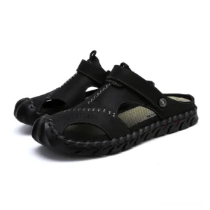 Men's black genuine leather gothic ankle-wrap sandals with hand-stitched detail - three-quarter front view
